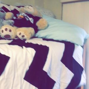 Twin XL mattress topper and sheet/duvet set.